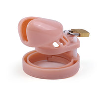 Elevate your play with our baby pink plastic device silicone cage. High-quality ABS plastic cage with an attachable harness, compatible with inflatable and electroshock toys like a dildo. Secure, comfortable, discreet.