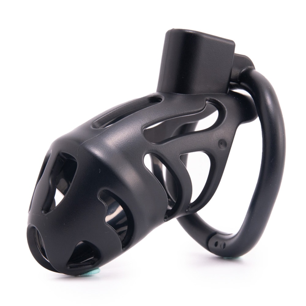 Experience glorious denial with this ergonomically designed black kit. The lightweight resin feels almost invisible on your body yet offers metal-like strength to securely encase your penis. With smaller dimensions and adjustable rings, you can find the perfect diameter for a snug, comfortable fit. This little device is meticulously crafted for long-lasting wear, ensuring your ultimate satisfaction.