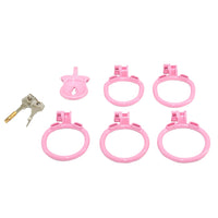 Embrace inverted Chastity with our Sissy Pink Clit Flat Cock cage. Designed for sissies male, this pink cage keeps you soft and secure. The clit-shaped pee hole feels like lips kissing you. Let your desires drip as you explore with a dildo.