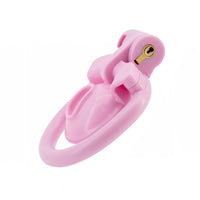 Immerse yourself in the Locked Sissy's pink resin embrace, as its nautilus-like shell guides your cock. Indulge in sissygasm bliss with anal probing, pushing submission beyond limits.
