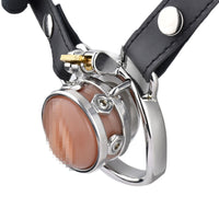 Embrace discreet dominance with our metal, perfect for mini dick restraint. Adjustable for a secure fit, it controls drip and leakage, ensuring no embarrassing leaks while eating out.