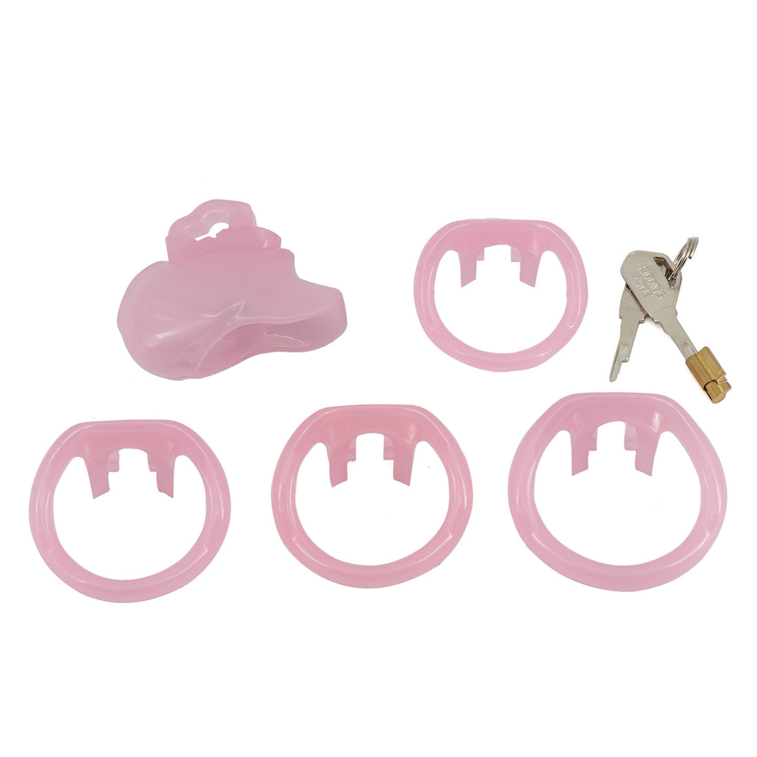 Meet the Cobra Trainer device crafted from pink resin with precise measurements for a perfect fit. Offering larger abstinence ring options, it includes multiple base rings for ultimate comfort. Lightweight, hypoallergenic, and discreet, this trainer ensures caging is easy and enjoyable.