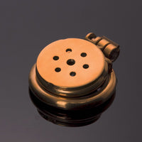 Introducing the Golden Gatling a mini device inverted for feminization male desires. Its standard vice-like fitment ensures comfort, while the golden faceplate hides your masculinity completely.