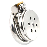 Embrace your submissive journey with the Flat Gatling stainless steel chastity device, featuring inversion for a flat silhouette. Ideal for small male anatomy, its gatling holes provide discreet ventilation, blending seamlessly under clothes. Perfect for feminization, dom-sub dynamics, and long-term wear, it keeps your urges in check while enhancing your femininity.