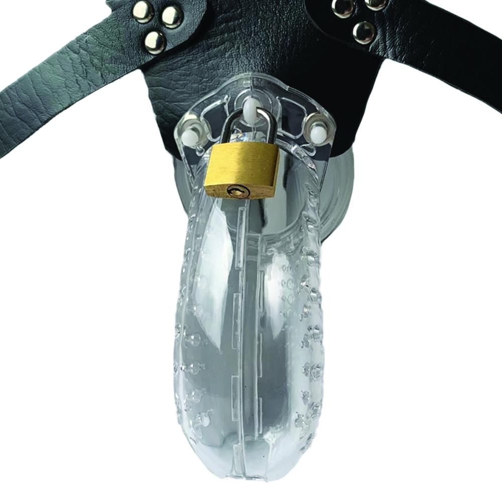 Experience ultimate control with the Clear Chastity Belt a transparent cage and harness. Pair it with a bra, shorts, shirt, shirts, or tights. Featuring a plug penis, it keeps him securely locked while you tease and tantalize.