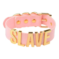 Discover the allure of our Handmade Leather Slave Choker in a striking black color. This choker offers adjustable comfort with its buckle and tubes. Pros include high-quality leather and bold design; cons may be the bold lettering not suiting subtle styles.