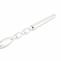 Experience unprecedented urethral pleasure with our wide, smooth, insertable rod. This chastity device penis plug enhances your sounding cock adventures, featuring a loop handle like a string for safe and easy control. Perfect for both beginners and enthusiasts.