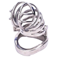 This stainless steel cock is a jewelry-like masterpiece, straight yet unremovable. Detained securely beneath its rivet, it elevates BDSM dynamics, blending style and control.