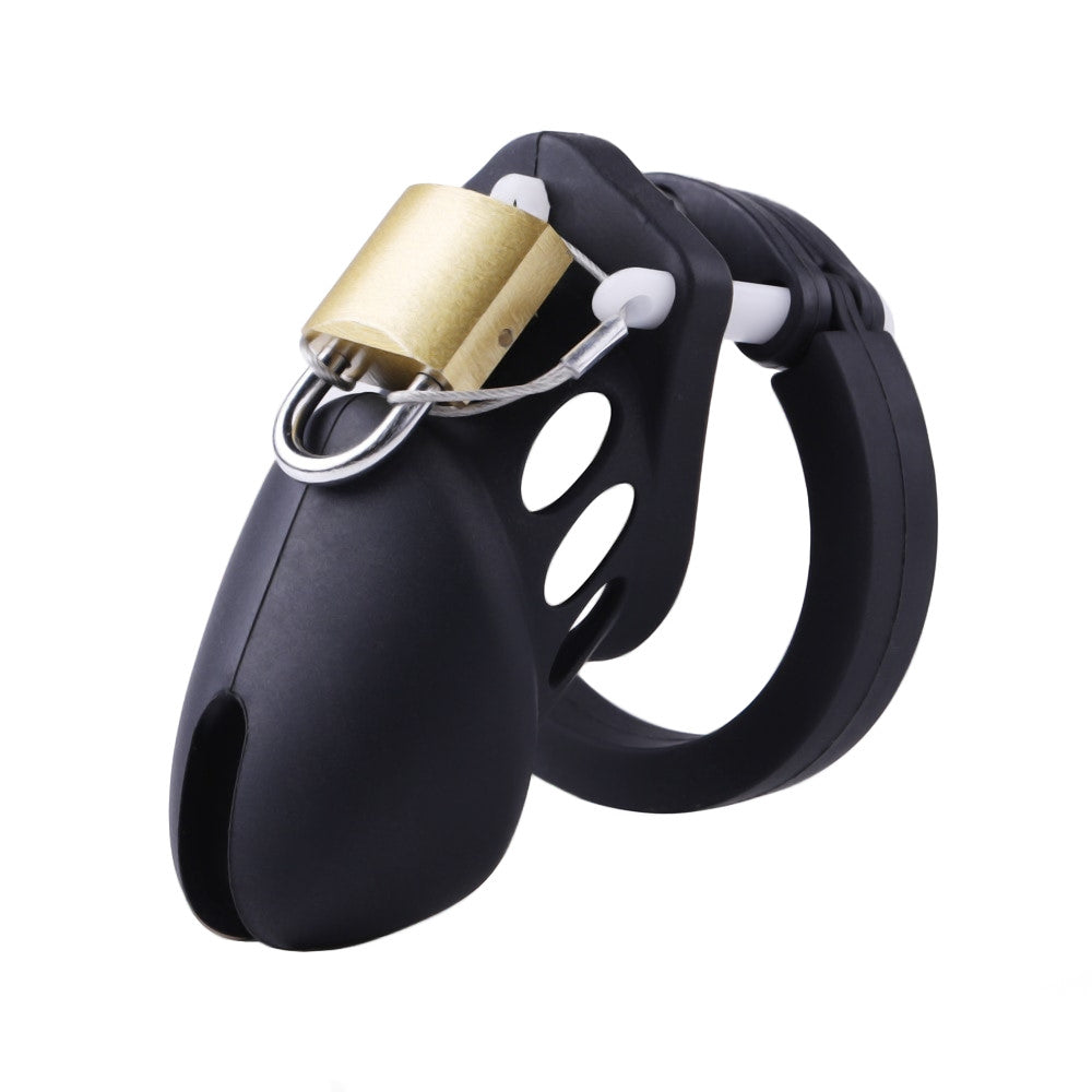 Embrace submission with our lightweight, hypoallergenic silicone cage, perfect for exploring male chastity. Strong yet discreet, it locks your cock, shifting macho energy into a balanced, masculine surrender. Available in varied colors like playful pink, this cage serves both dominant and submissive dynamics, reinforcing relational control and enhancing intimacy without discomfort.
