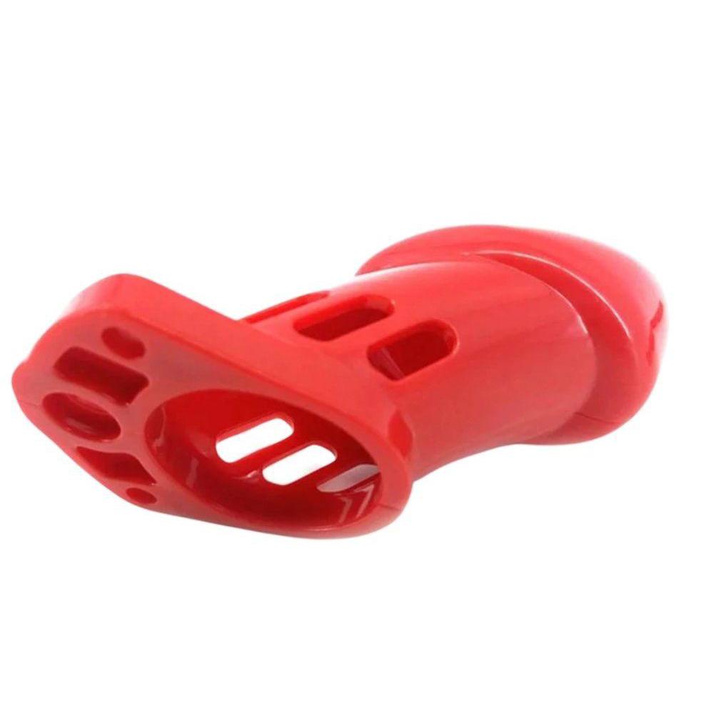 Experience ultimate control with our rigid red device. Featuring adjustable cock ring sizes for a perfect fit, this lockless design ensures security without cumbersome locks much like a rattlesnake's grip, it's sleek and uncompromising.