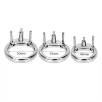 Enhance your jailhouse play with this durable, heavy metal ring. Its compatibility ensures an inescapable experience while being detector-friendly. Ideal for cock kit estim and sounding male scenarios, it offers extra security and comfort, making it perfect for long-term commitment in BDSM sessions.