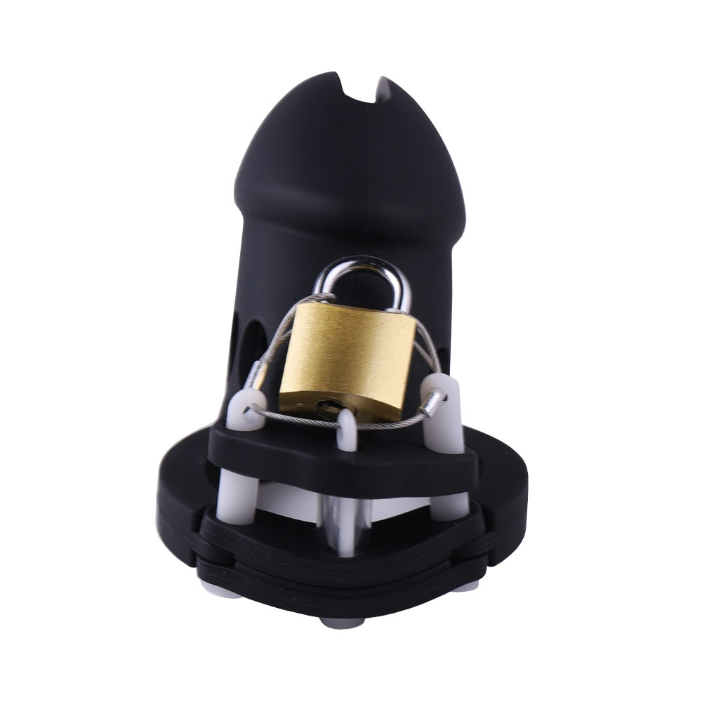Experience ultimate submission with our black silicone chastity cage. Designed to serve and restrain, this comfortable yet secure device offers subs the perfect blend of service and control. Embrace the tantalizing tease and the cruel delight of denied pleasure.