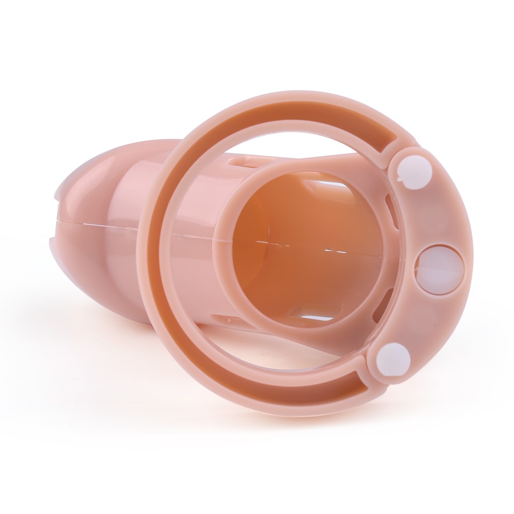 Experience the progression of control with our Baby Pink Plastic Sissy Cock cage. Made from high-quality ABS plastic, this discreet device keeps the alpha lion within you caged, letting you reign like a king over your desires.