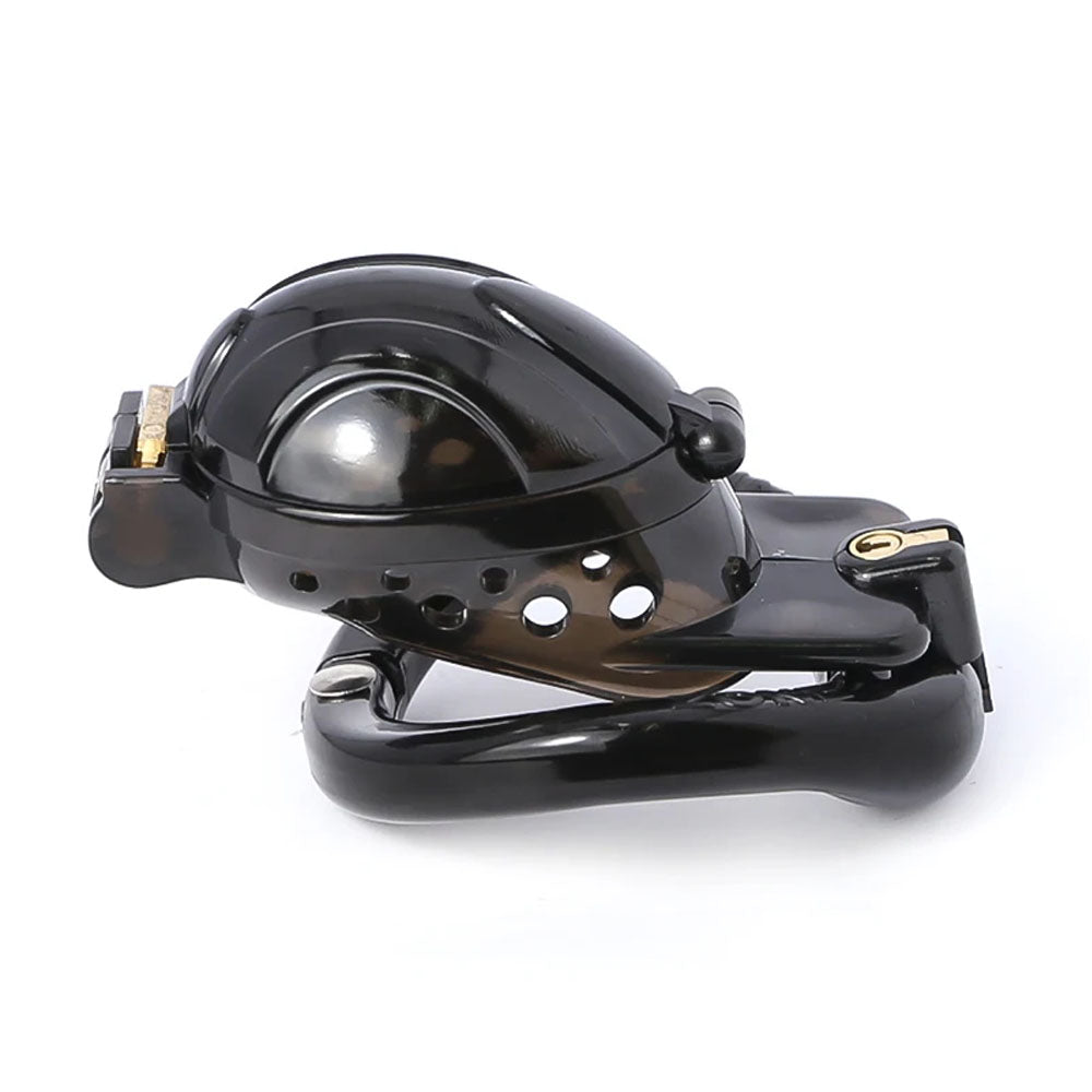 Tired of negative experiences with ill-fitting devices? The Lock, Stock, And Cage is a ball-trap chastity device that securely traps without the need for piercing. Its adjustable rings prevent testical slippage, ensuring your Sub stays locked and comfy!
