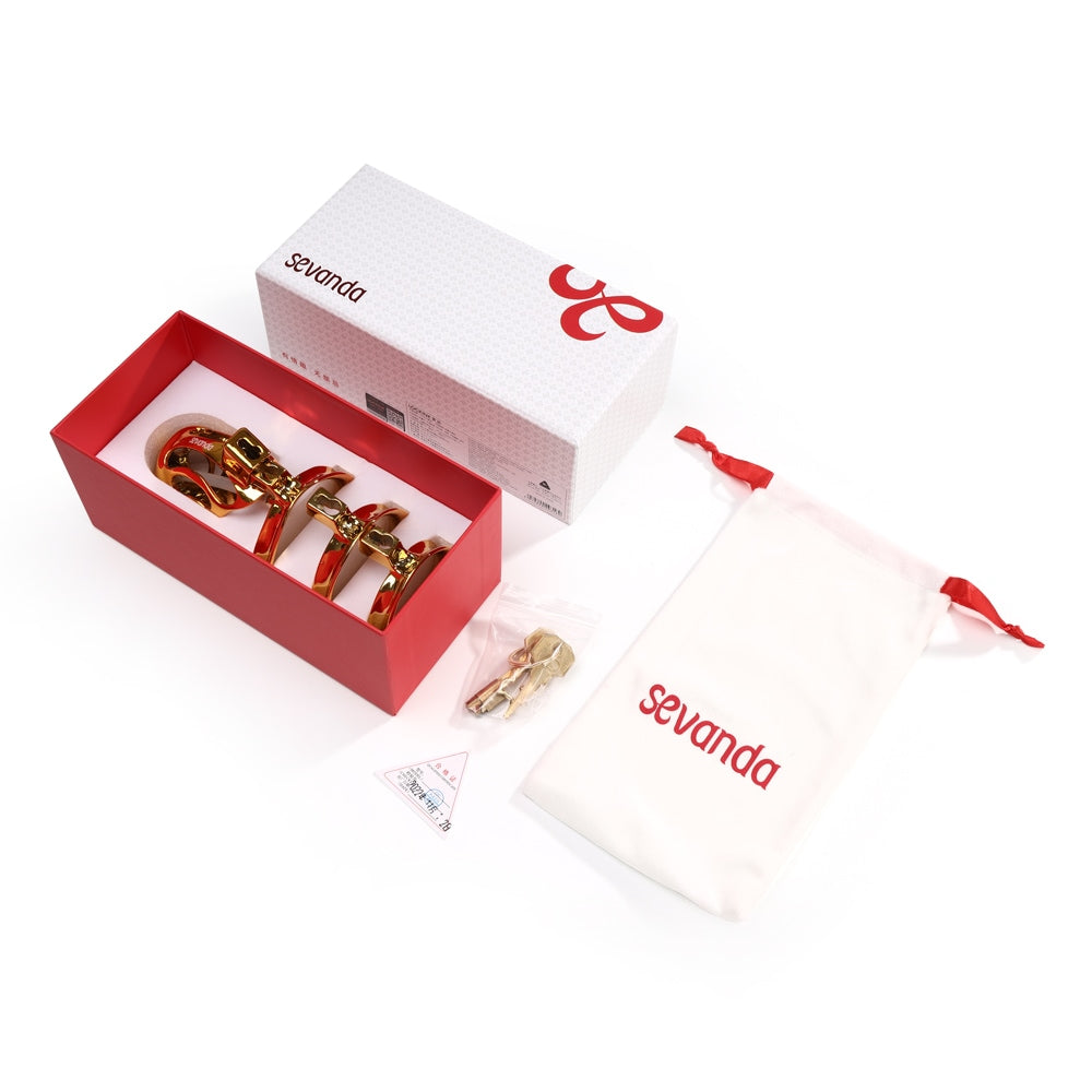 Experience ultimate security with the unremovable Sevanda Golden cage. Designed for comfort even during airport travel, this luxurious device ensures your key holder&#39;s control. Compatible with Albert piercings, it celebrates your pledge in all its glory.