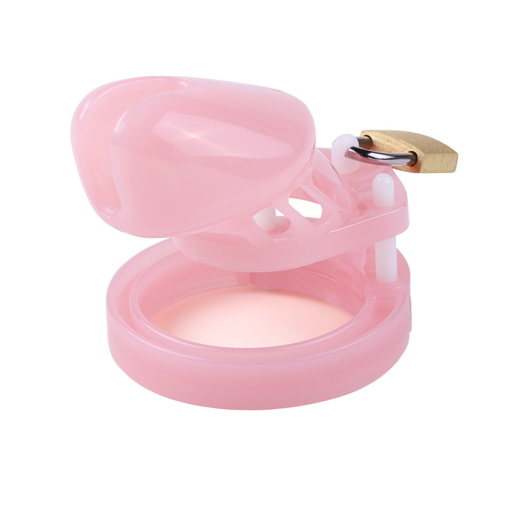 Experience the perfect blend of fun and humiliation with our chastity long pink plastic male chastity cage. This device keeps you shamefully horny and ready for pegged play, enhancing your most intimate moments.