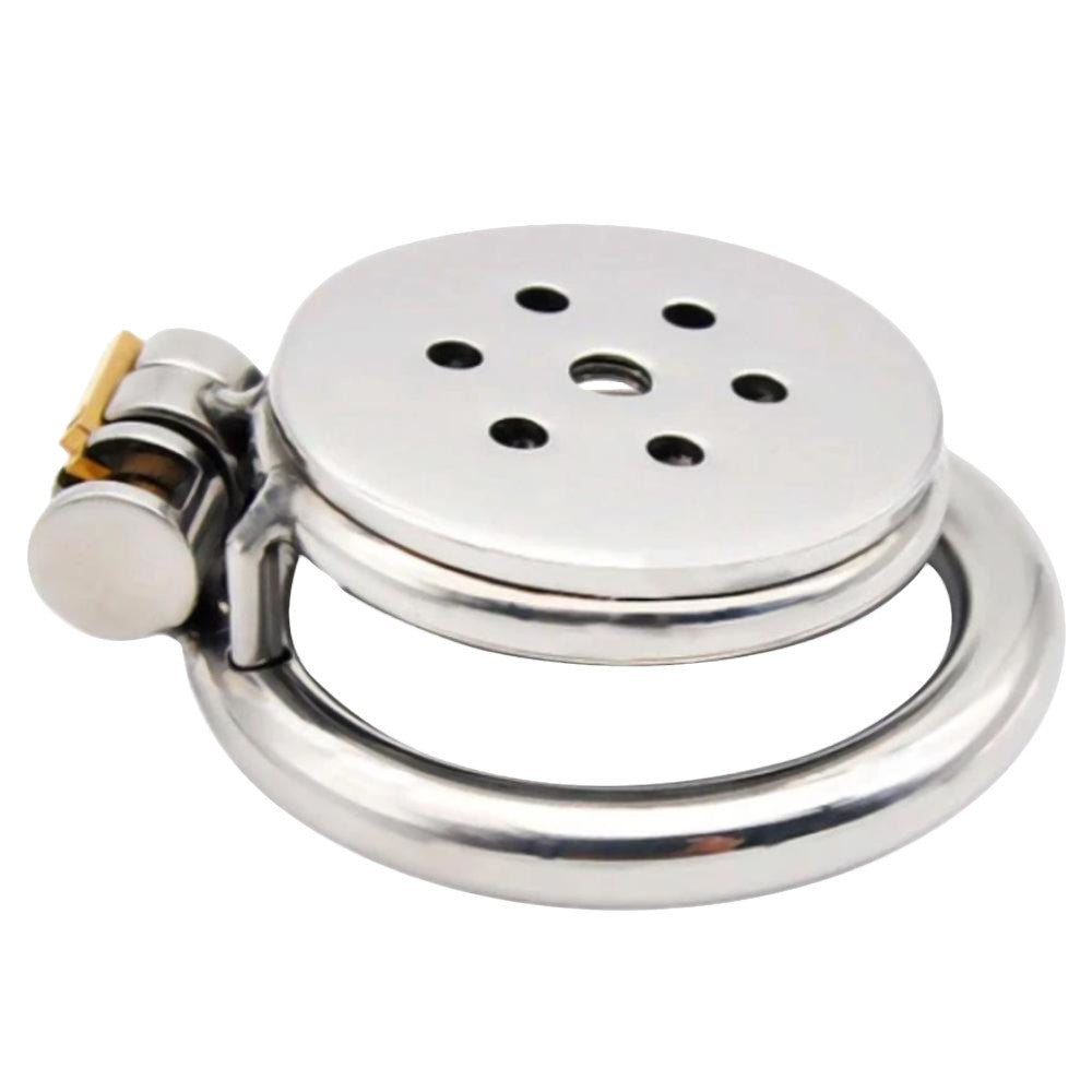 Securely explore your desires with The Flat Gatling, a discreet stainless steel cage perfect for under shorts or swimwear like a speedo or bikini. With its customizable fit, it offers ultimate control and comfort while its spiked design reminds you who's in charge. Ideal for those seeking subtlety and submission in any outfit.