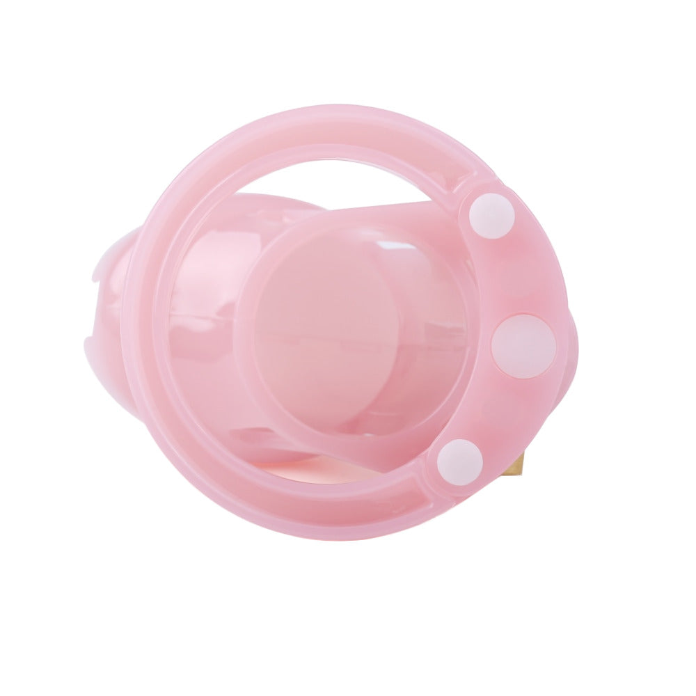 Embrace your girly side with this pink chastity cage, perfect for femboys seeking a feminized touch. Wearing it adds a playful flair, enhancing your journey of self-expression and confidence.