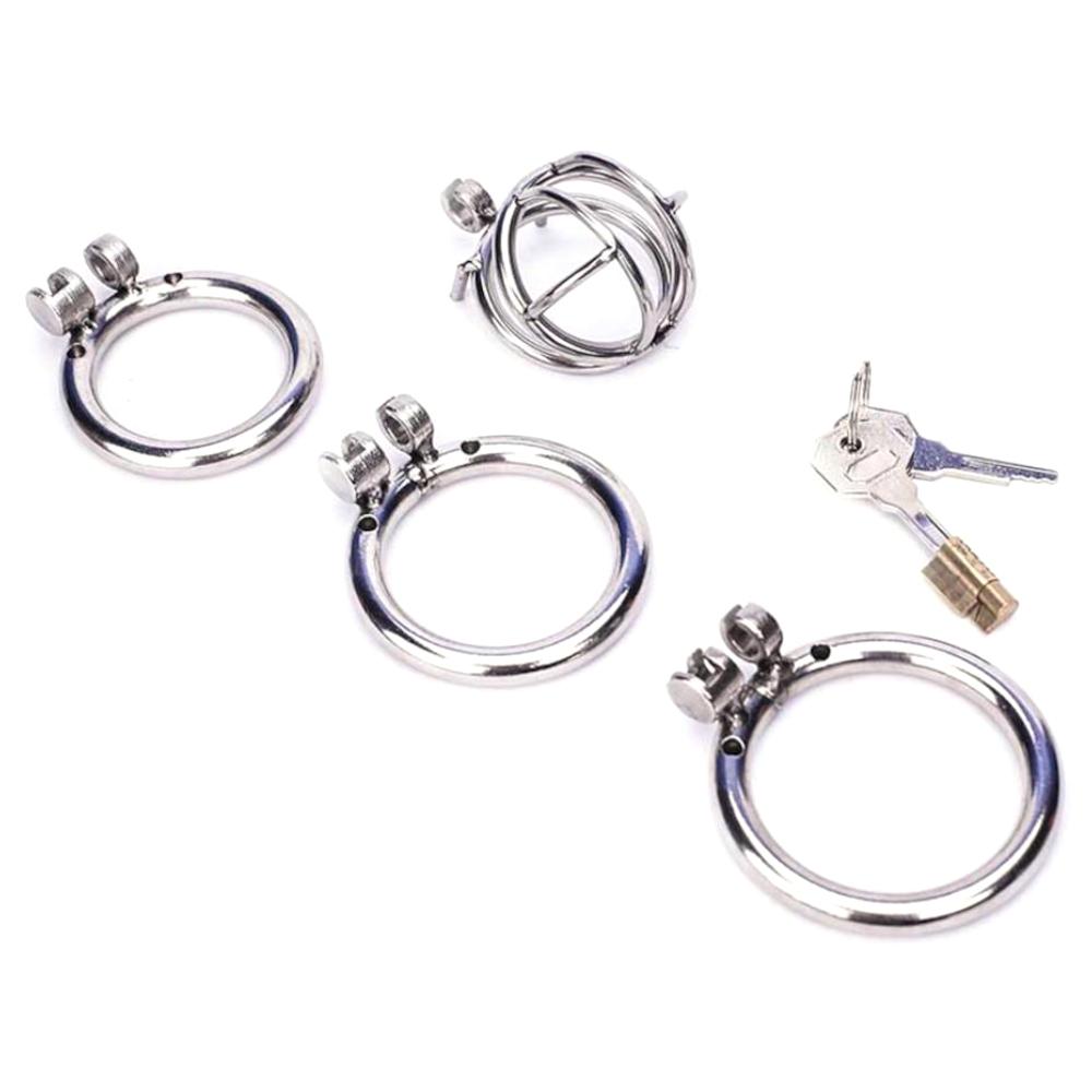 Elevate your chastity play with the unique, minimalist Cock kit Of Shame, offering secure detainment for even the smallest cock. Enjoy electroshock fun and shame-defying submission with its open design.