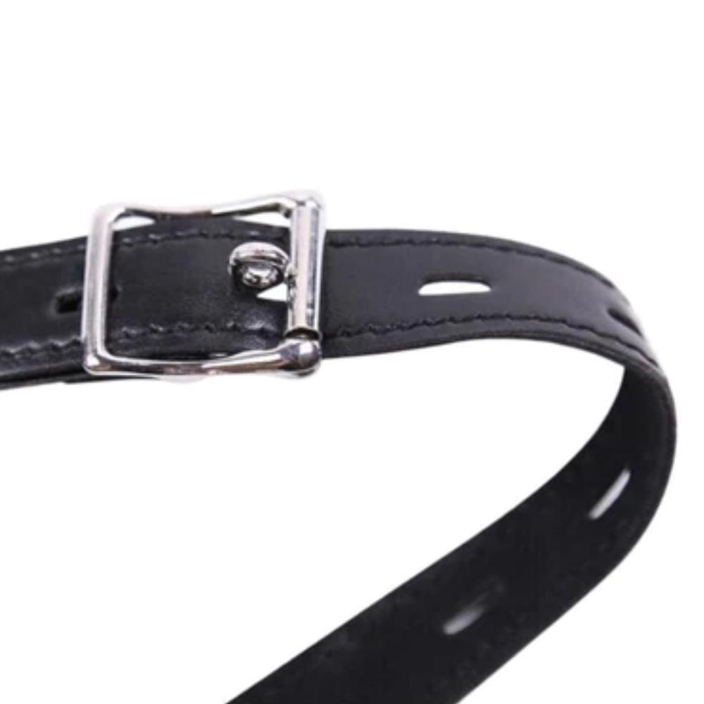 Discover ultimate restraint with our black leather belt for women. Its exposed design pokes at your desires, while adjustable straps ensure a comfortable fit from head to skin. Perfect for those pegged to explore new boundaries.